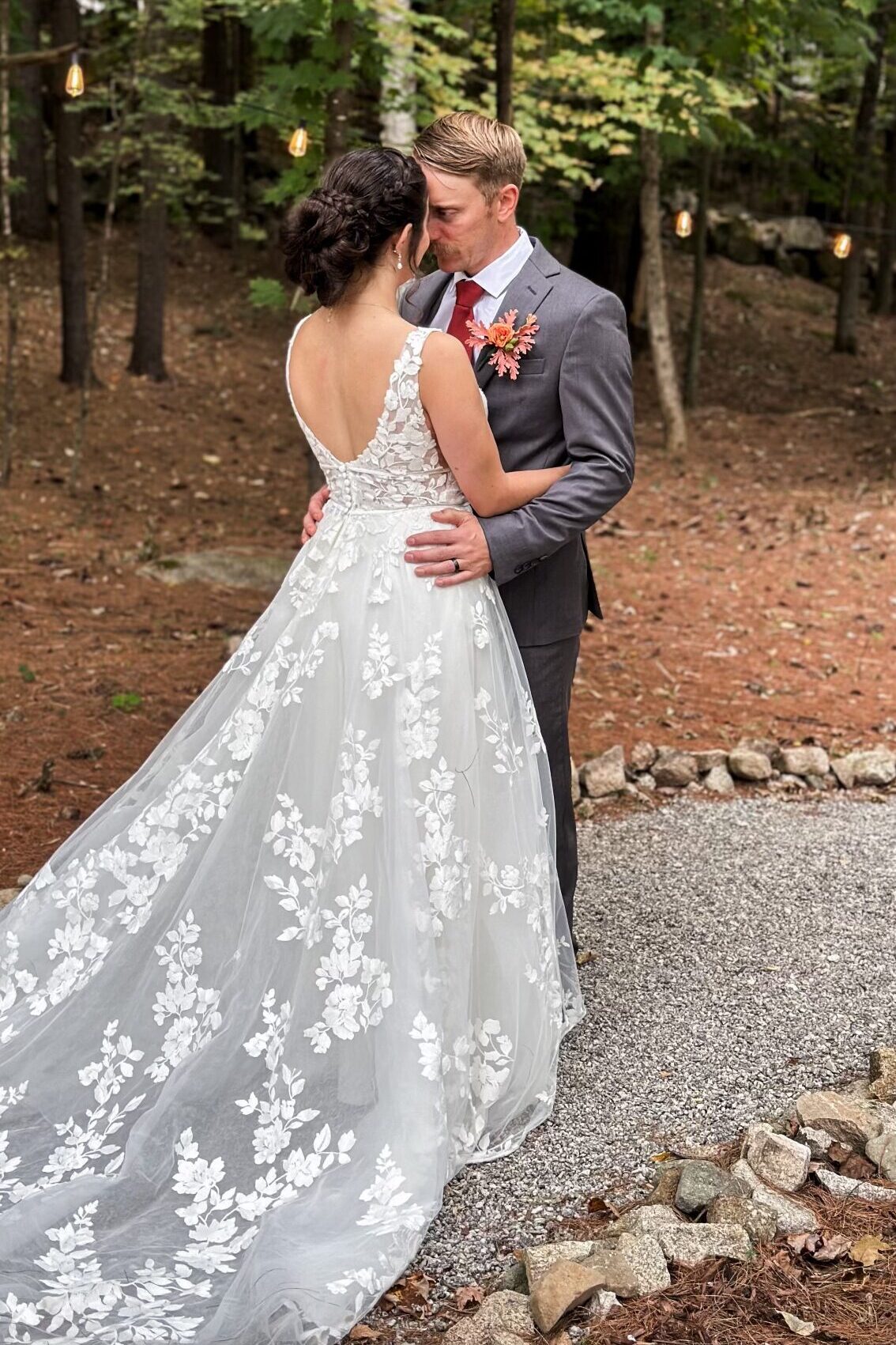 uuid=41A0E831-204A-4BAB-B98C-DD0BBC772C26library=1type=1mode=2loc=truecap=true bride and groom on wooded stone path