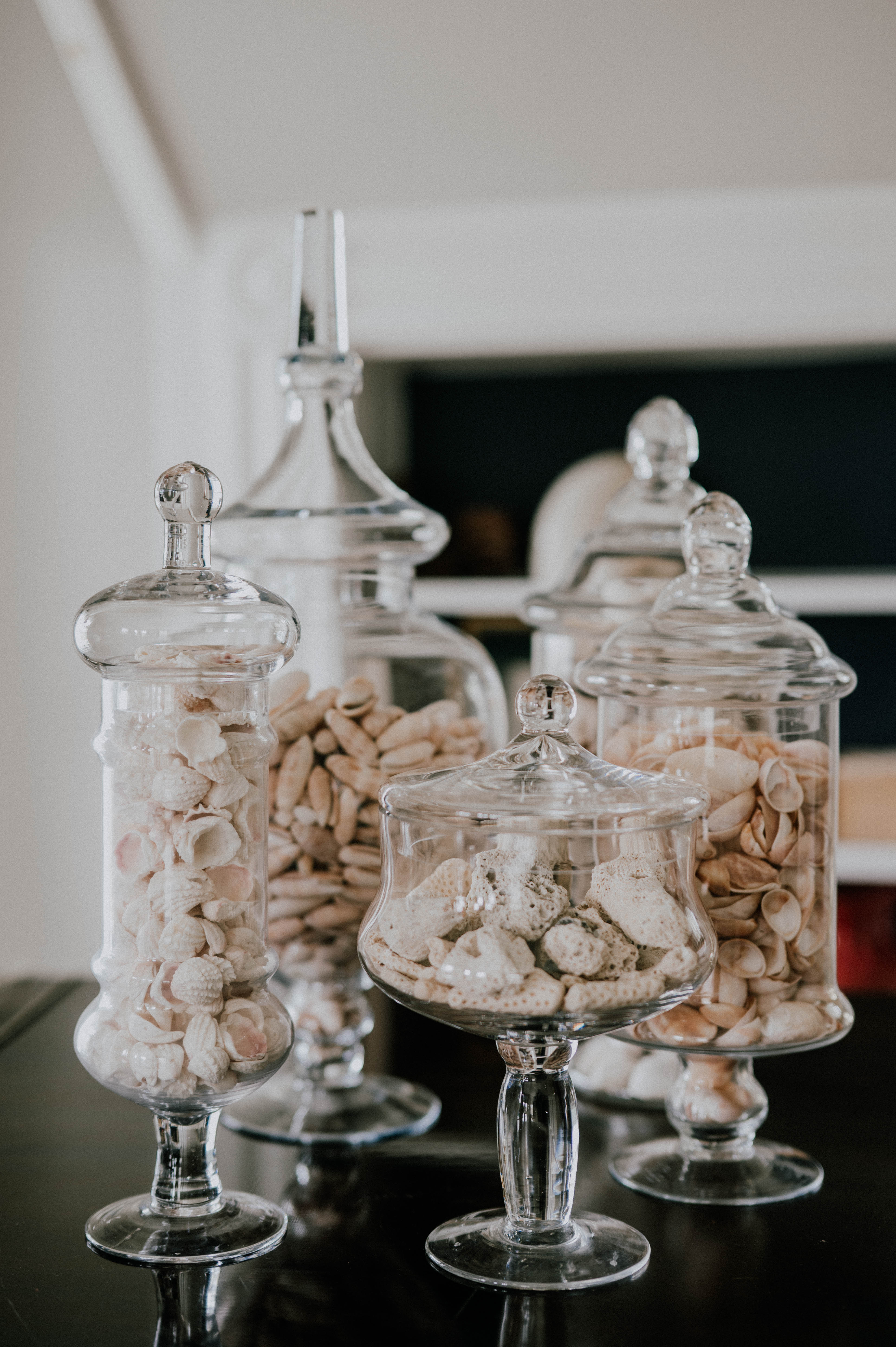 seashells in glass jars
