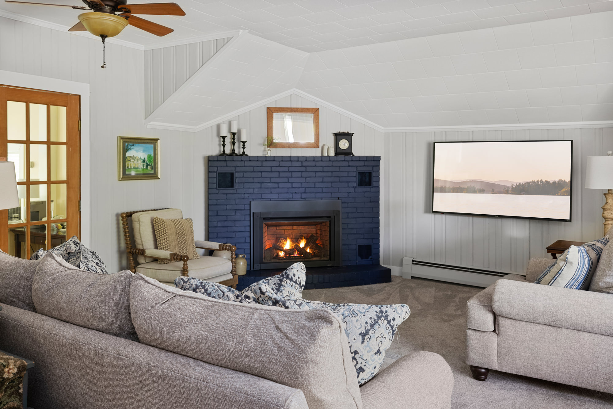 comfy sofas in front of fireplace