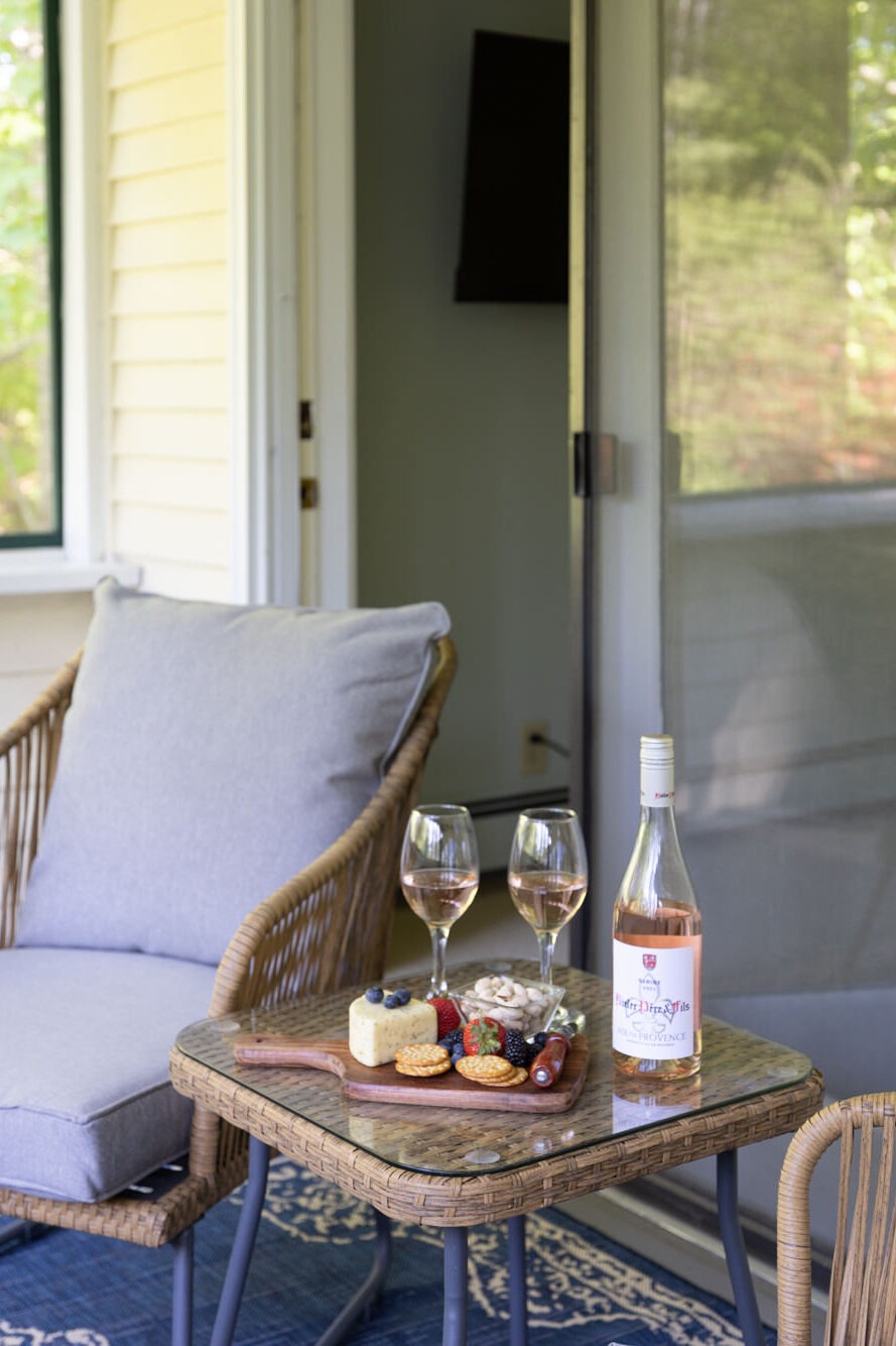 patio with wine and fruit and cheese board